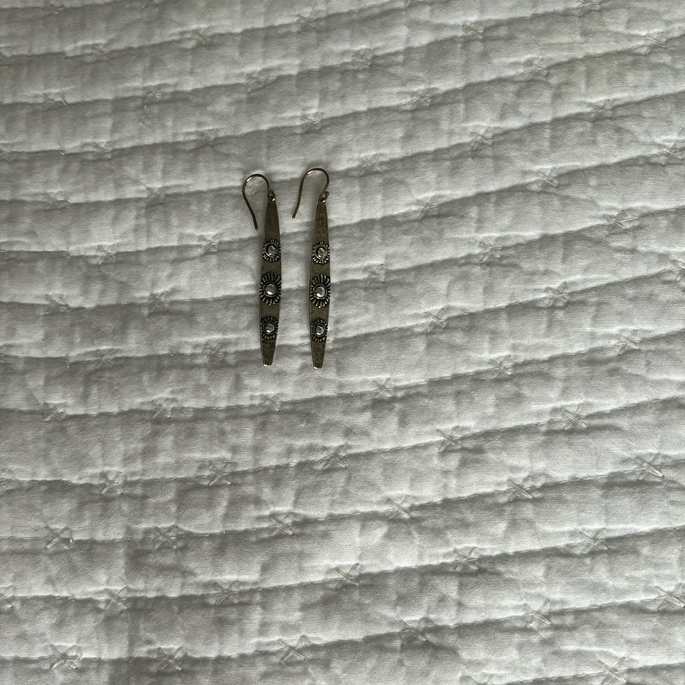 Silver Silpada earrings with small flower designs, pre owned.